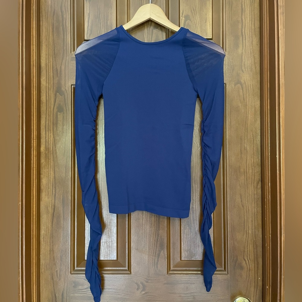 Free People intimately long sleeved top with sheer mesh sleeves